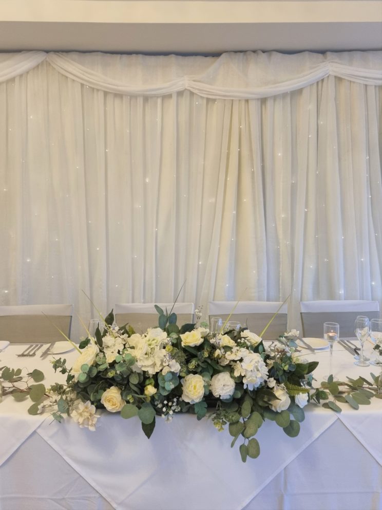 Top Table And Back Lit Curtain